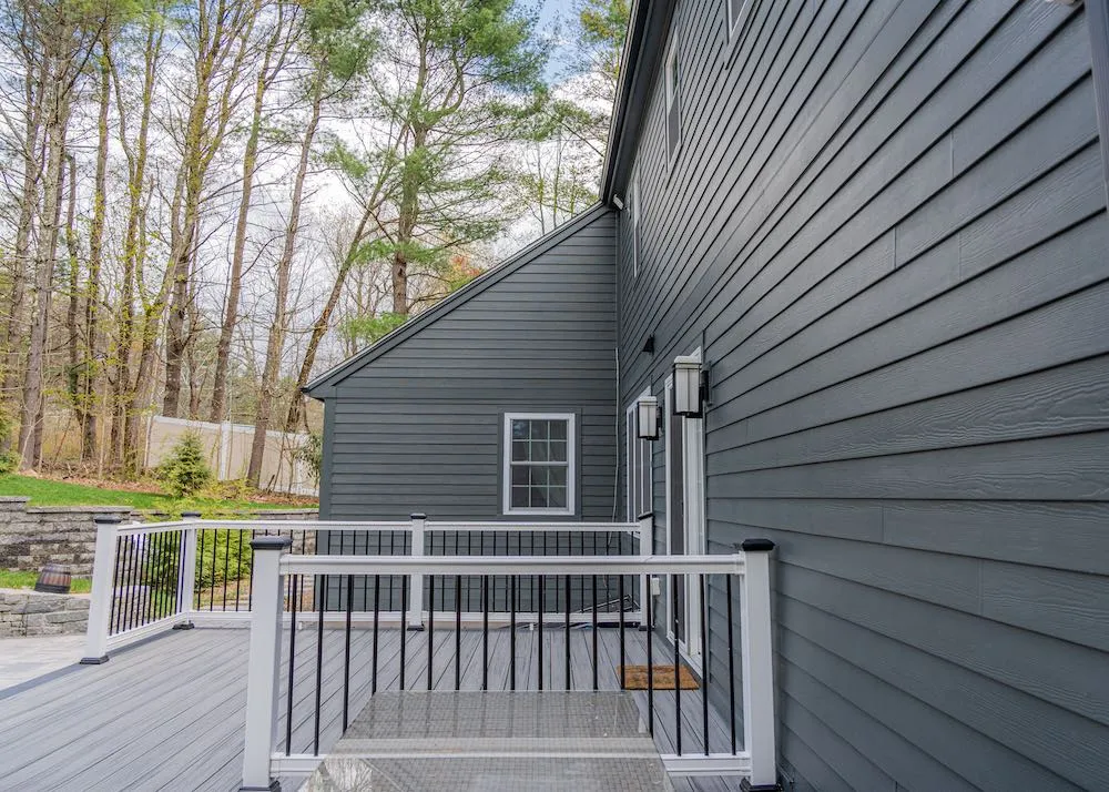 Golden Group Roofing exterior of home with hardie siding.