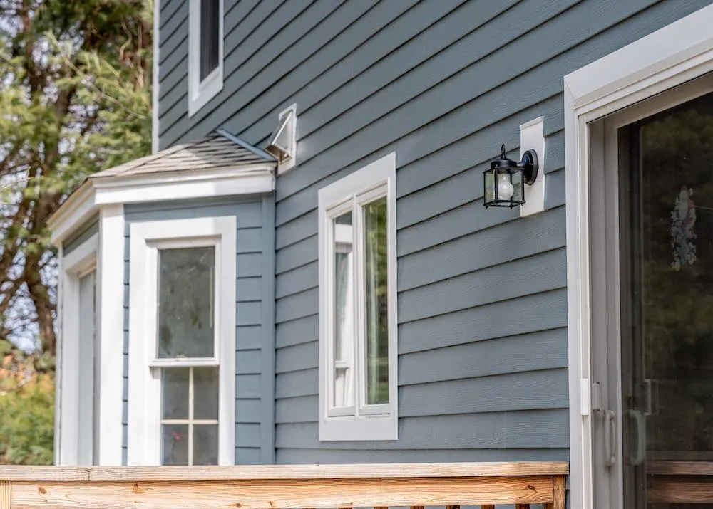 Golden Group Roofing exterior of home with hardie siding.