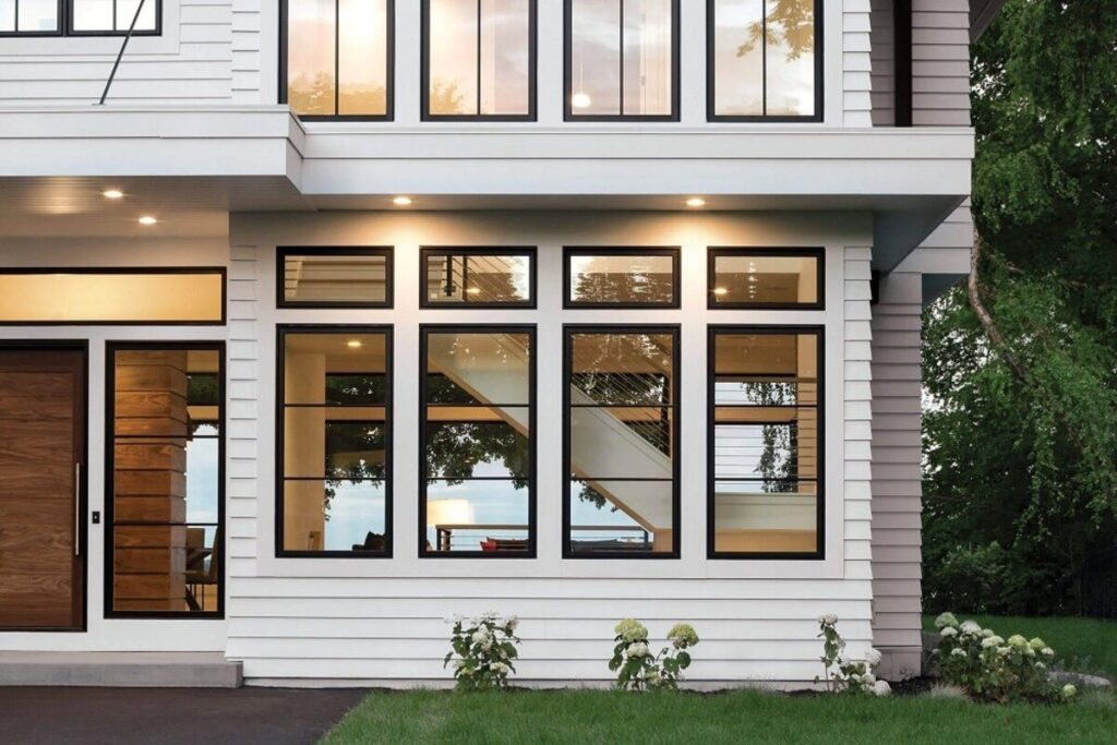 Newly installed windows on a home. Learn the 12 Benefits of Window Replacement by Golden Group Roofing.
