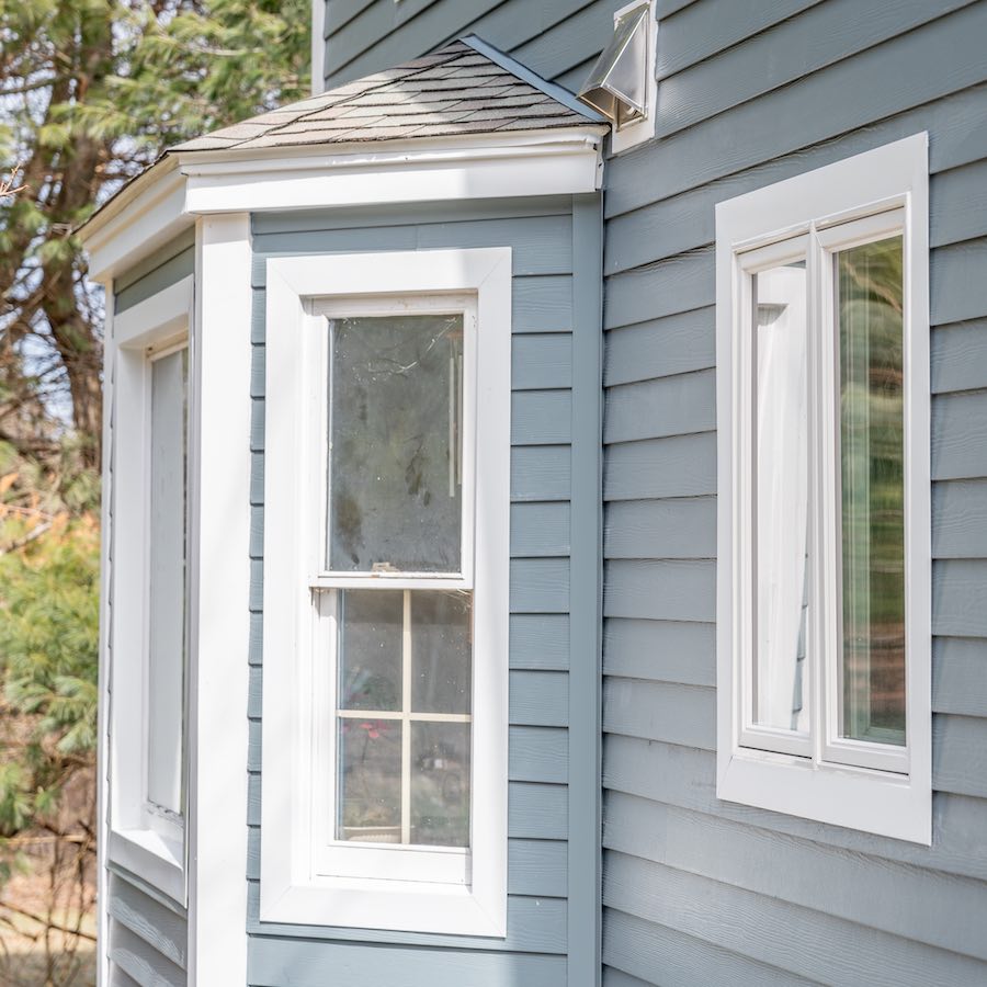 Golden Group Roofing exterior of home with hardie siding.