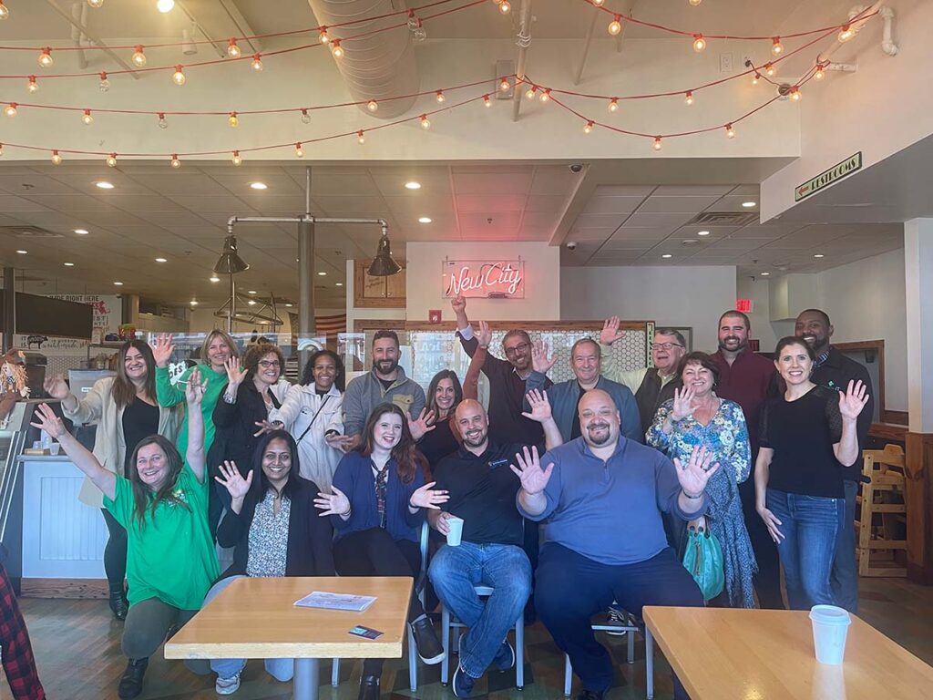 The Hudson Business Association in Hudson, MA group photo during a Friday Fire Up monthly meeting.