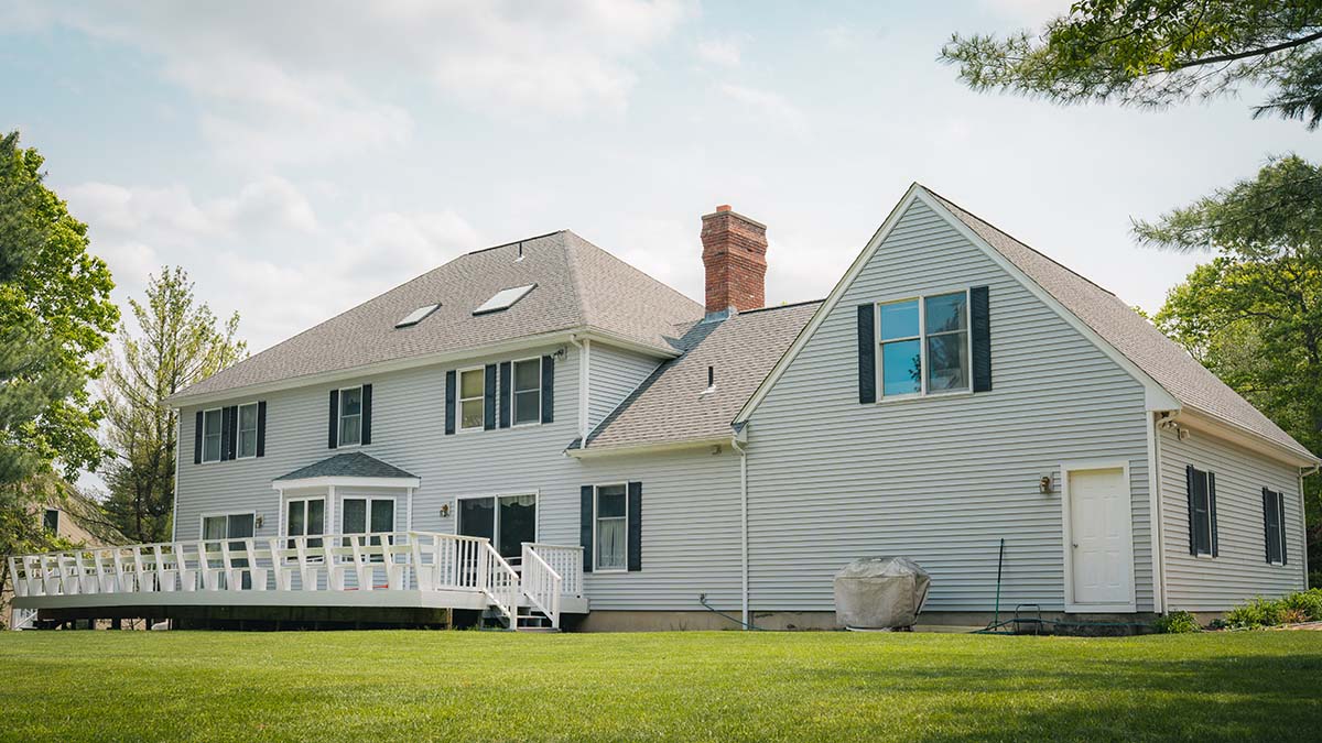 Side view of a home with home siding done by Golden Group Roofing.Home Siding Questions to Ask Your Contractor for Your Greater Boston Area Home.