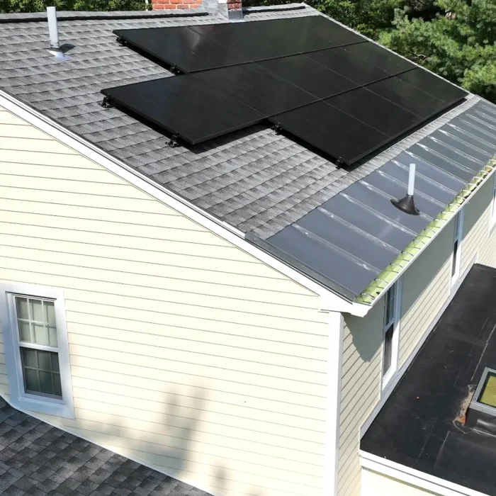 Aerial view of a Completed Solar Roofing Solution project on a shingled roof in Westborough, MA